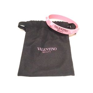 Pink rubber Valentino bracelet with pouch